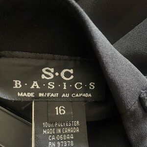 Dressy black skirt size 16 with a split in the back.